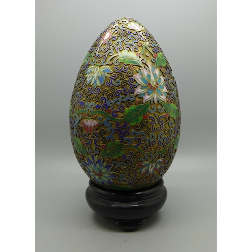630 - A cloisonne egg on stand, a/f, dented, egg 17cm