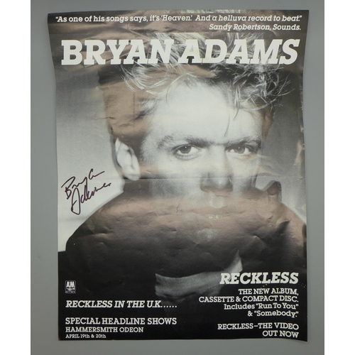 646 - A Bryan Adams signed picture