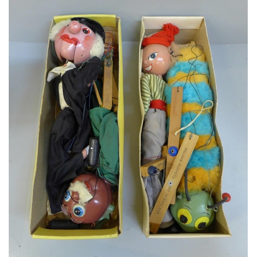 659 - Three Pelham puppets including caterpillar with box