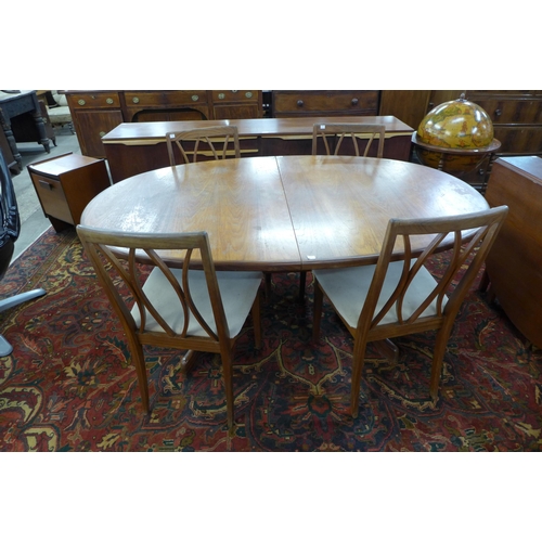 28 - A G-Plan Fresco teak extending dining table and four chairs