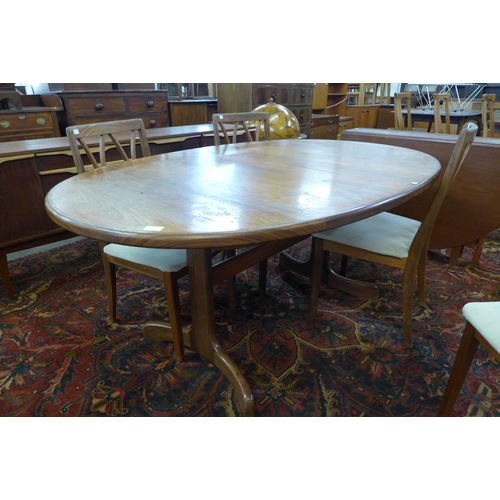 28 - A G-Plan Fresco teak extending dining table and four chairs
