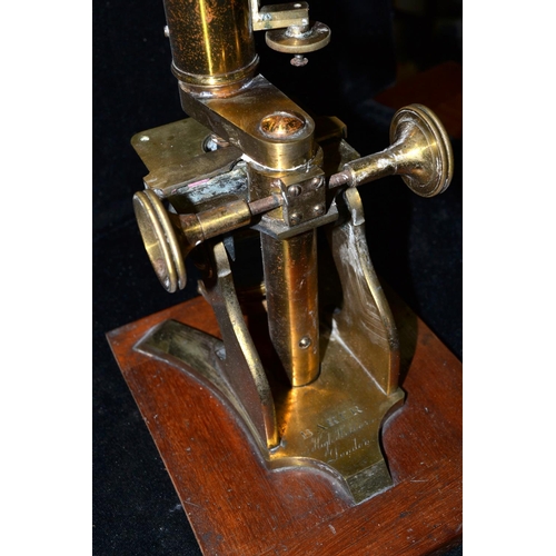 An antique brass microscope by Baker of High Holborn, London