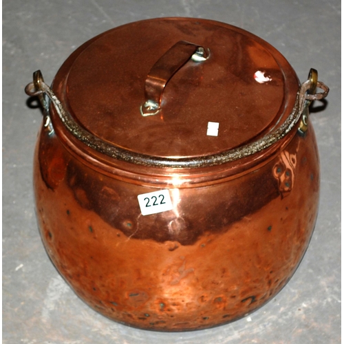 A large antique copper cooking pot