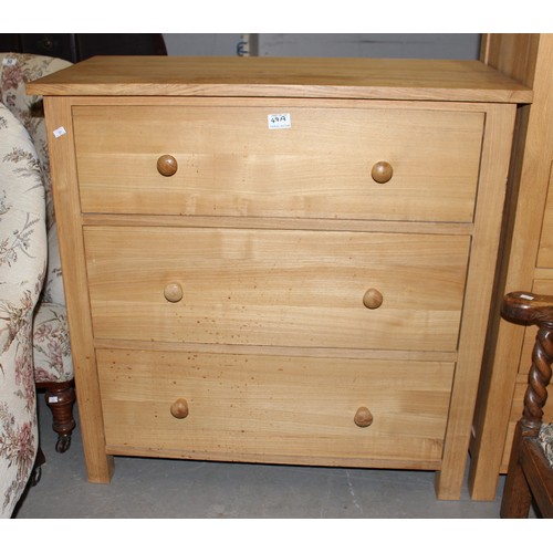 49a - A 3 drawer light oak finished chest of drawers