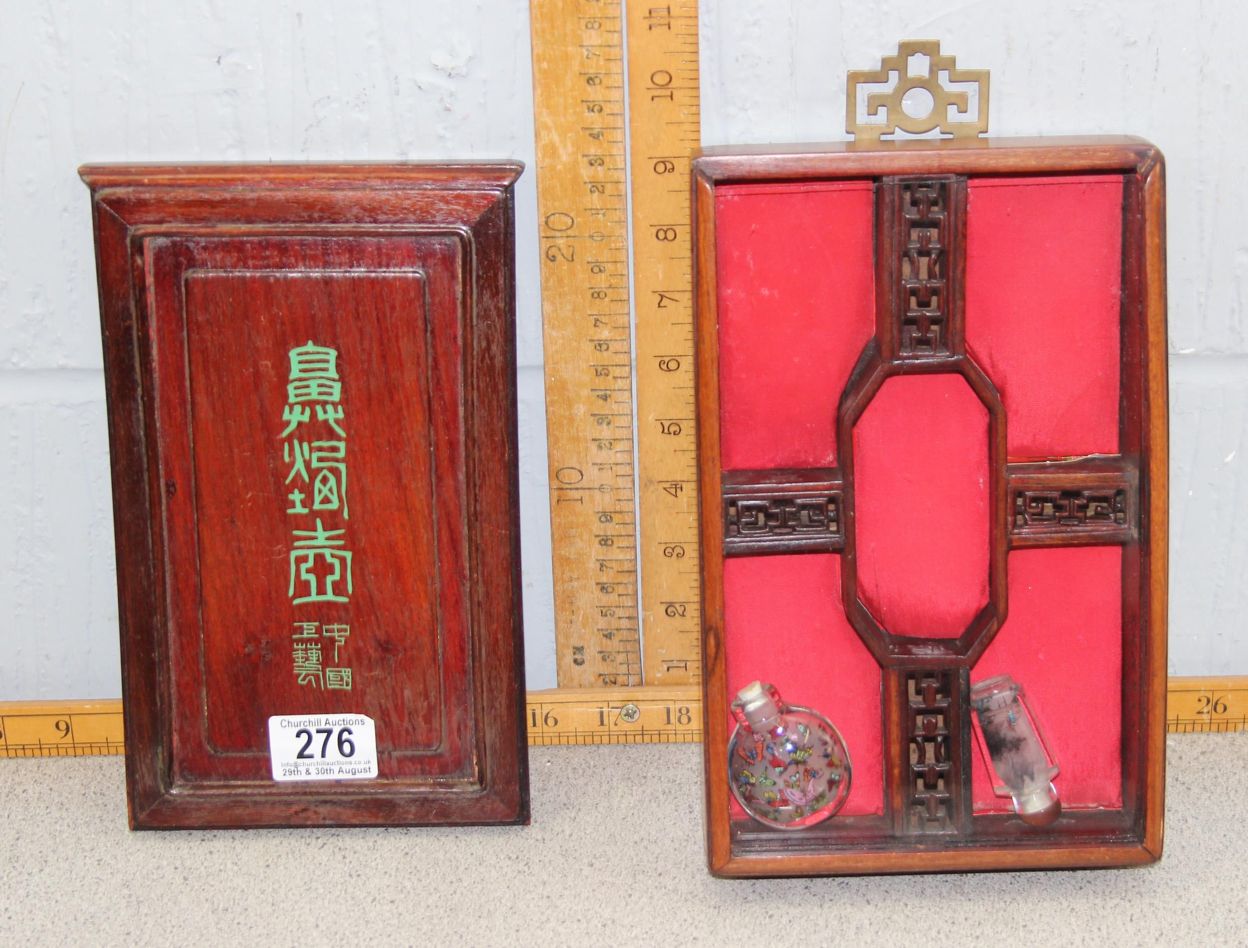 Small Chinese display cabinet containing 2 inside painted snuff bottles