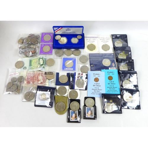 45 - A collection of coins including a silver £1 proof coin, various £5 coins and various silver coins. (... 