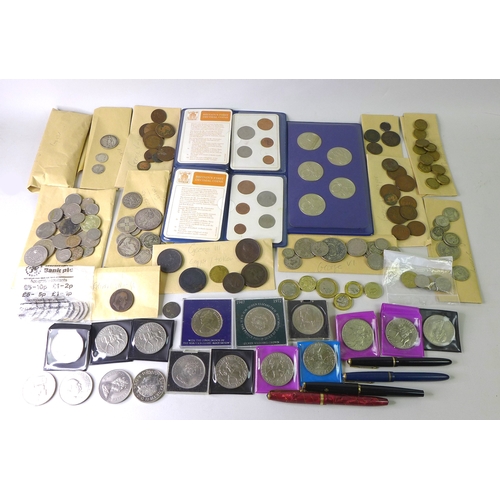 47 - A collection of UK coins, including a £5 coin commemorating the Queen Mother, 2000, three £1 coins, ... 