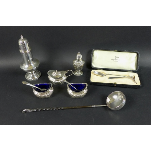 16 - An assortment of silver items, comprising an early 20th century sugar sifter by Gorham Manufacturing... 