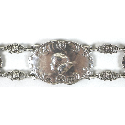 39 - An Edward VII silver christening belt, formed of nine oval plaques each cast in relief with Reynold'... 