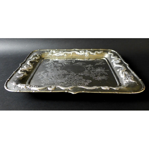 32 - A Chinese export silver tray, late 19th century, of rectangular form, with central engraved decorati... 