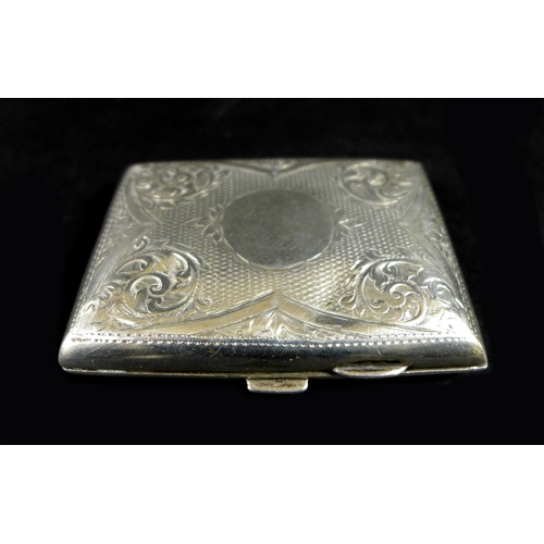 24 - An Edwardian silver cigarette case, with parcel gilt interior, a blank cartouche, Birmingham 1905, 7... 