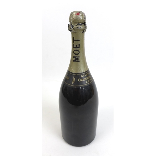 107 - A bottle of Moet & Chandon 1943 Coronation Cuvee vintage champagne, released in 1953 for Elizabeth I... 