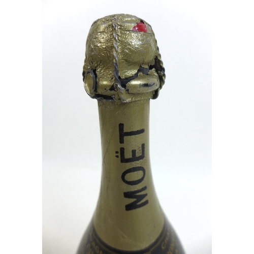 107 - A bottle of Moet & Chandon 1943 Coronation Cuvee vintage champagne, released in 1953 for Elizabeth I... 