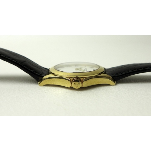 96 - A Patek Philippe Calatrava 18k gold cased lady's wristwatch, reference 4906, circa 2006, the circula... 