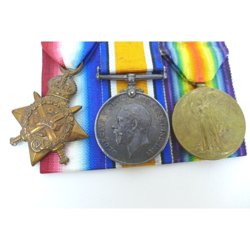 100 - A trio of WWI medals and a Death Plaque for 9664 Private P. C. Bowers, including a 1914 Mons Star, a... 