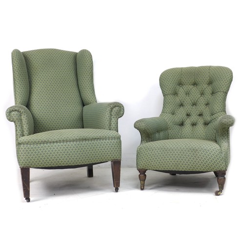 191 - A mid 20th century wing back armchair, with tapered legs, upholstered in green diamond patterned fab... 