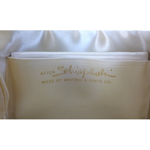 105 - Vintage designer Schapparelli: a mid 20th century cream silk satin with gold coloured mesh overlay e... 