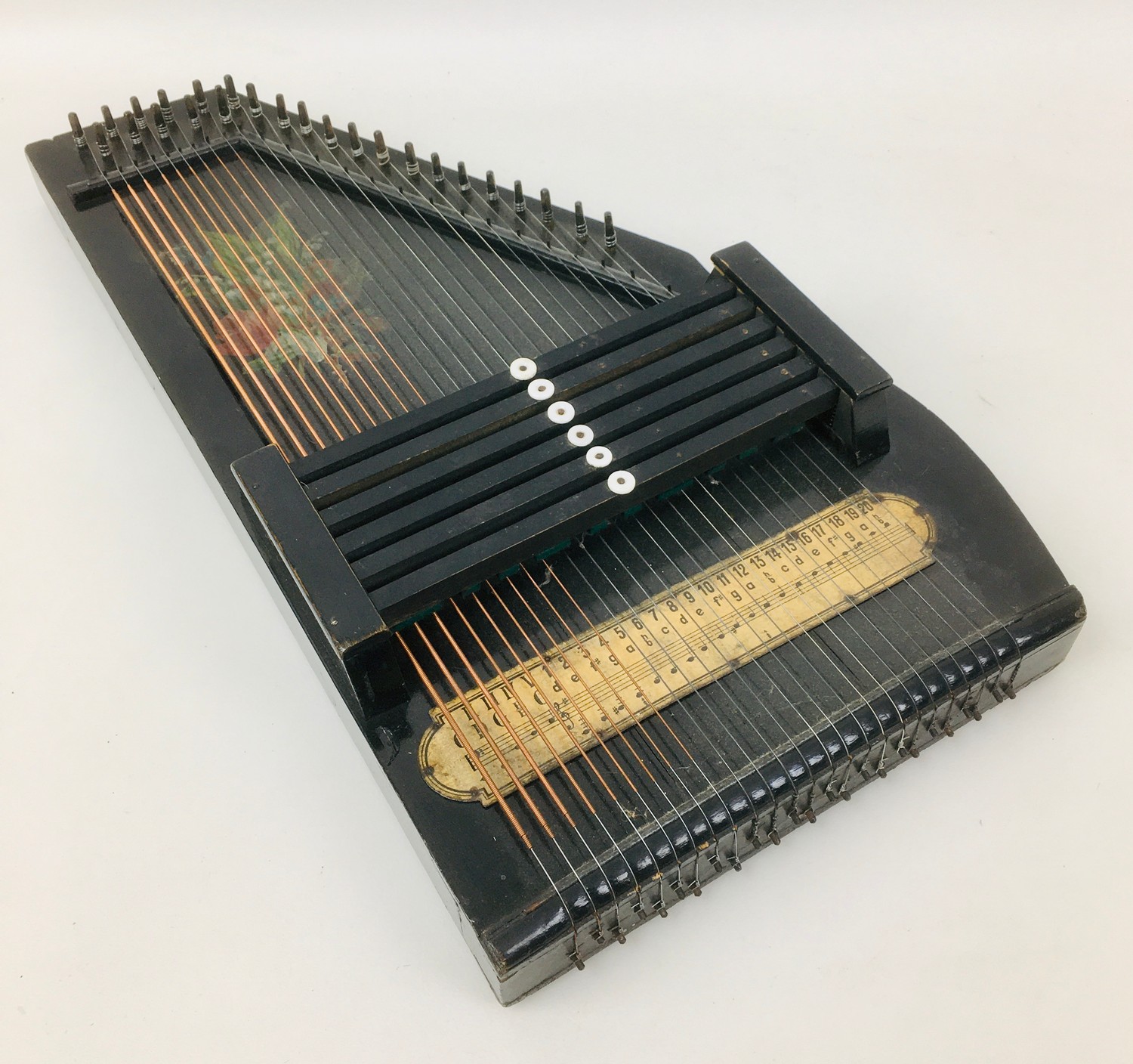 A mid 20th century zither, 25 strings - Auktionen & Preisarchiv