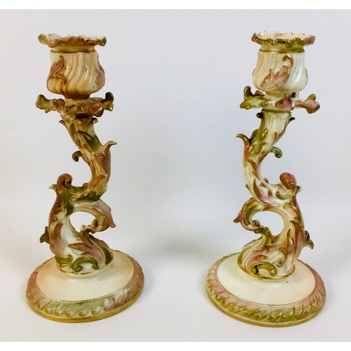 42 - A group of late 19th and early 20th century Royal Worcester ivory blush porcelain, comprising a pair... 