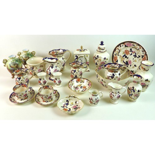 11 - A collection of Masons Ironstone ceramics, decorated in the Mandalay pattern, including a mantel clo... 