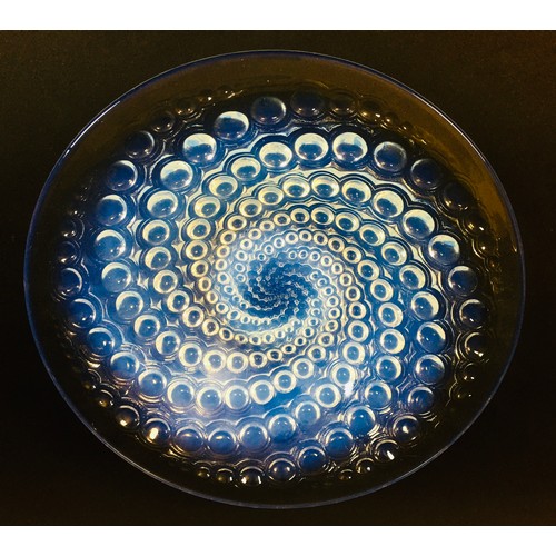 56 - A Rene Lalique 'Volutes' clear and opalescent glass bowl, with spiralling dot design, signed 'R. Lal... 