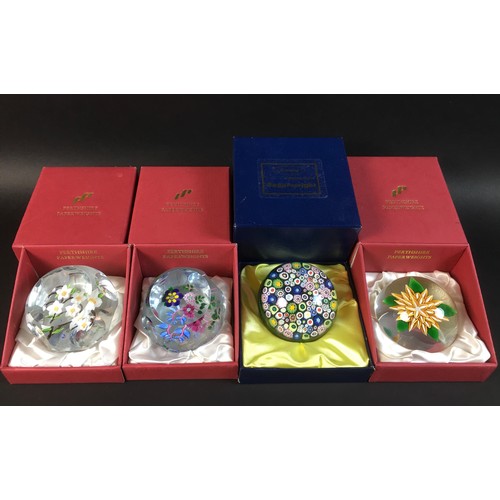 51 - A group of ten paperweights, comprising a Millefiore limited edition Pheonix Paperweights Ltd weight... 