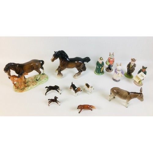 35 - A collection of thirteen Beswick figurines, including a fox, 10 cm by 3.3 by 5.5cm high, two hounds,... 