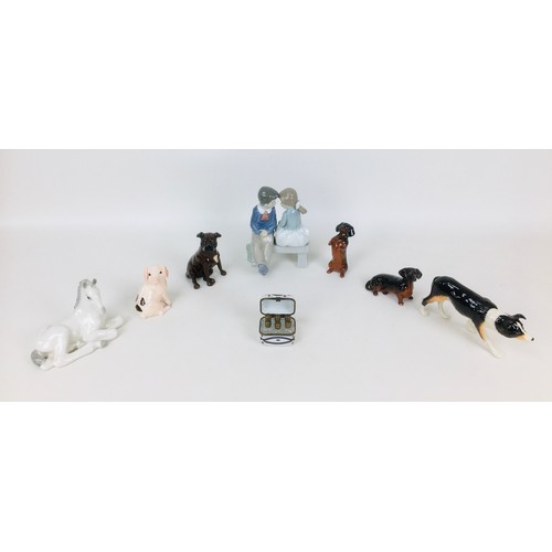 36 - A group of eight Beswick, Limoges and other porcelain items, comprising a four Beswick animal figuri... 