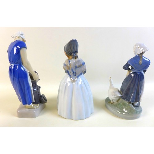 33 - A group of five figurines and a moon flask, comprising Lladro figurine 'Pedro with jug' matte, 12141... 