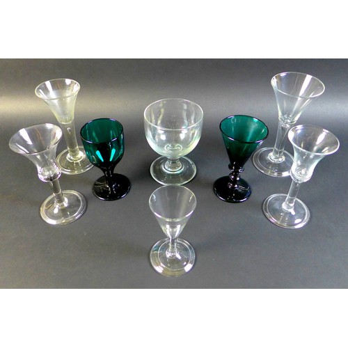 59 - A collection of 18th and 19th century drinking glasses, comprising four Georgian glasses, each with ... 
