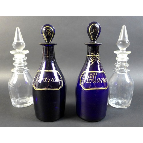 61 - A pair of Georgian Bristol blue decanters and stoppers, with gilt painted ‘labels’ held by painted ‘... 