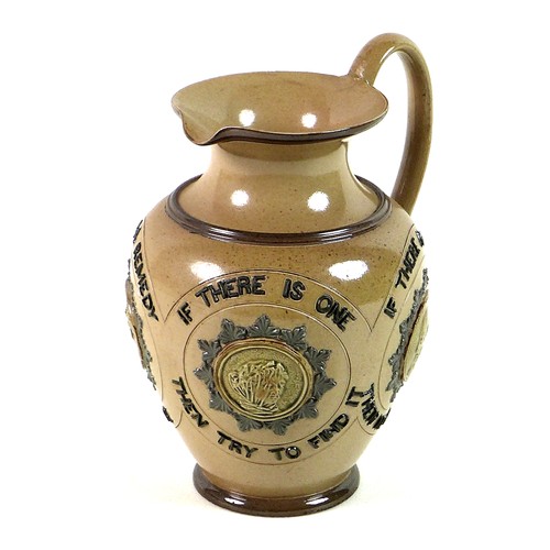18 - An Edwardian Doulton Lambeth harvest ware jug, decorated with four relief cast panels with bust meda... 