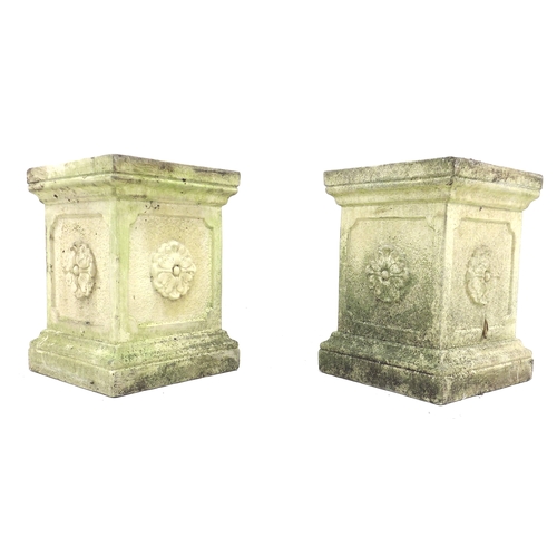 270 - A pair of square form stoneware garden pedestals, each side decorated with a single rose, in possibl... 