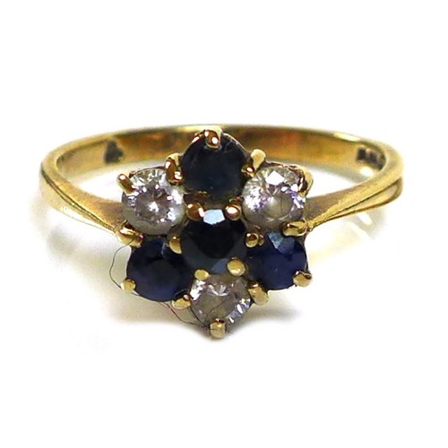 336 - A 9ct gold, diamond and sapphire flowerhead ring, central round cut sapphire set about with three fu... 