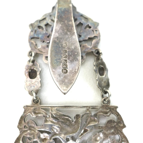 1 - A Edwardian silver plated chatelaine, the belt buckle featuring Green Man decoration, fitted with si... 