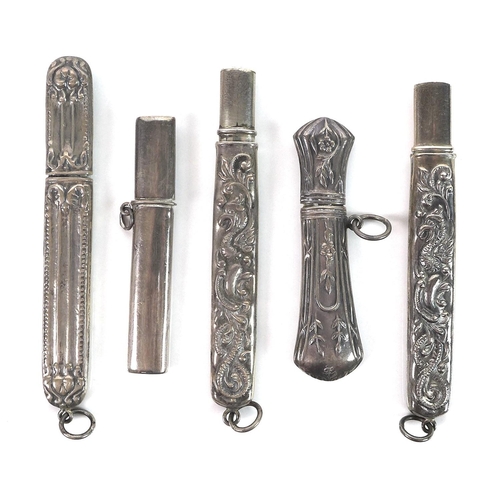 16 - A group of five Edwardian silver pencil holders, four with embossed decoration, one engraved, total ... 