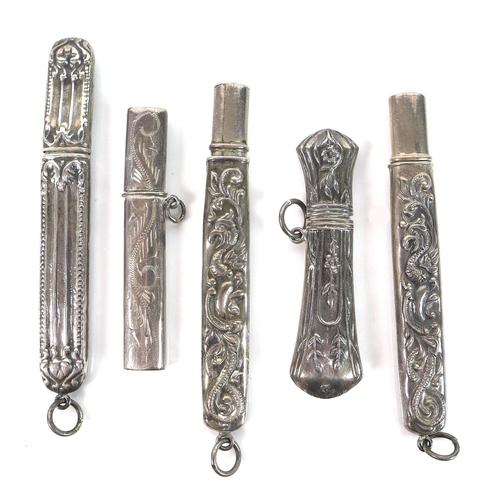 16 - A group of five Edwardian silver pencil holders, four with embossed decoration, one engraved, total ... 
