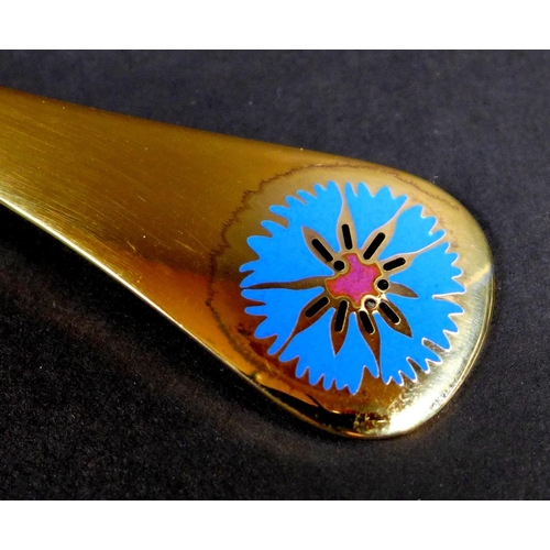 34 - A Georg Jensen gilt Sterling silver 1972 year spoon, with enamel corn marigold to its finial, Design... 
