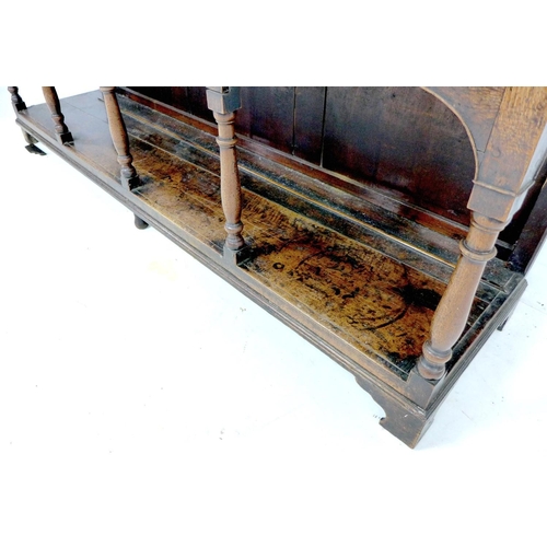 242 - A large George III oak Welsh dresser, cornice over a closed three shelf waterfall plate rack, the ba... 