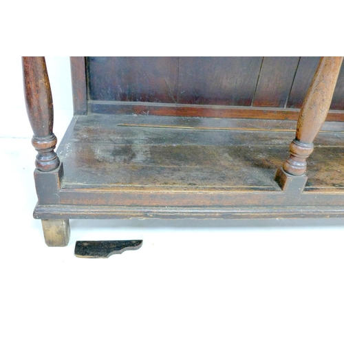 242 - A large George III oak Welsh dresser, cornice over a closed three shelf waterfall plate rack, the ba... 