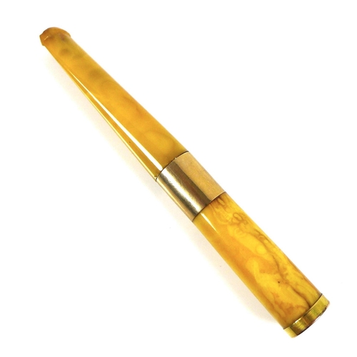157 - A mid 20th century 9ct gold mounted amber cheroot holder, with yellow metal band to its middle, a/f,... 