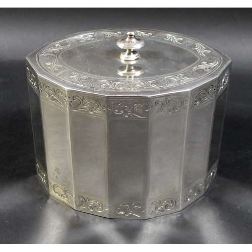 77 - A George III silver tea caddy, of fourteen sided navette form, the oval flush hinged cover with knop... 