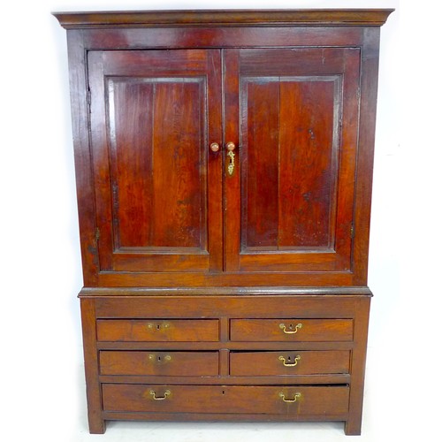 358 - A Georgian oak linen press, with twin door top section without slide drawers and adapted into a ward... 