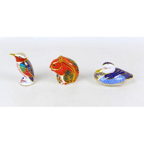 97 - Three Royal Crown Derby paperweights, comprising a Humming Bird, signed by John Ablitt, gold stopper... 