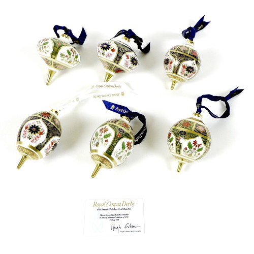 94 - A group of six Royal Crown Derby Christmas decorations, comprising 'Imari Holiday Droplet Bauble', b... 