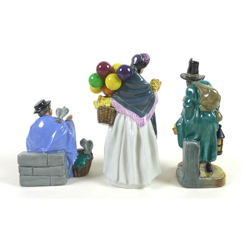 29 - A group of three Royal Doulton china figurines, comprising 'The Mask Seller', HN2103, 21.5cm high, '... 