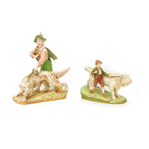 39 - Two large Royal Dux figurines, comprising a boy walking with a bull, with applied maker's stamp, and... 