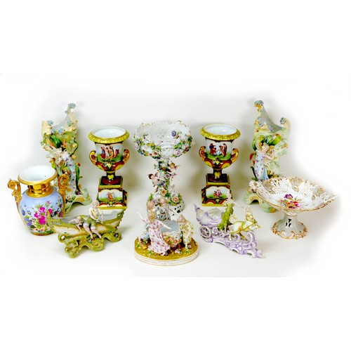 21 - Ten 19th century style porcelain centrepieces and spill vases, including a Dresden style centrepiece... 
