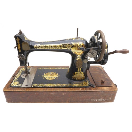 52 - A mixed group of collectables, including a vintage Singer hand crack sewing machine with case, seria... 