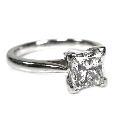 303 - A platinum and diamond solitaire ring, the princess cut stone approximately 6.1 by 6.0mm, 1.33ct, si... 